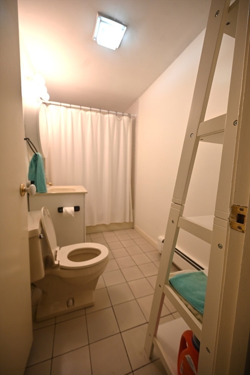69 North Margin Street, Unit B Boston, MA 02113 - Photo 8 of 13 a bathroom with a sink and a toilet