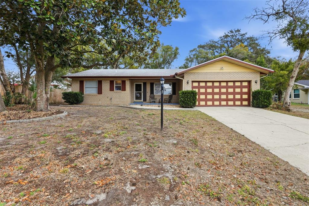 244 Angeles Road DeBary, FL 32713 - Photo 5 of 41 front view of a house with a yard