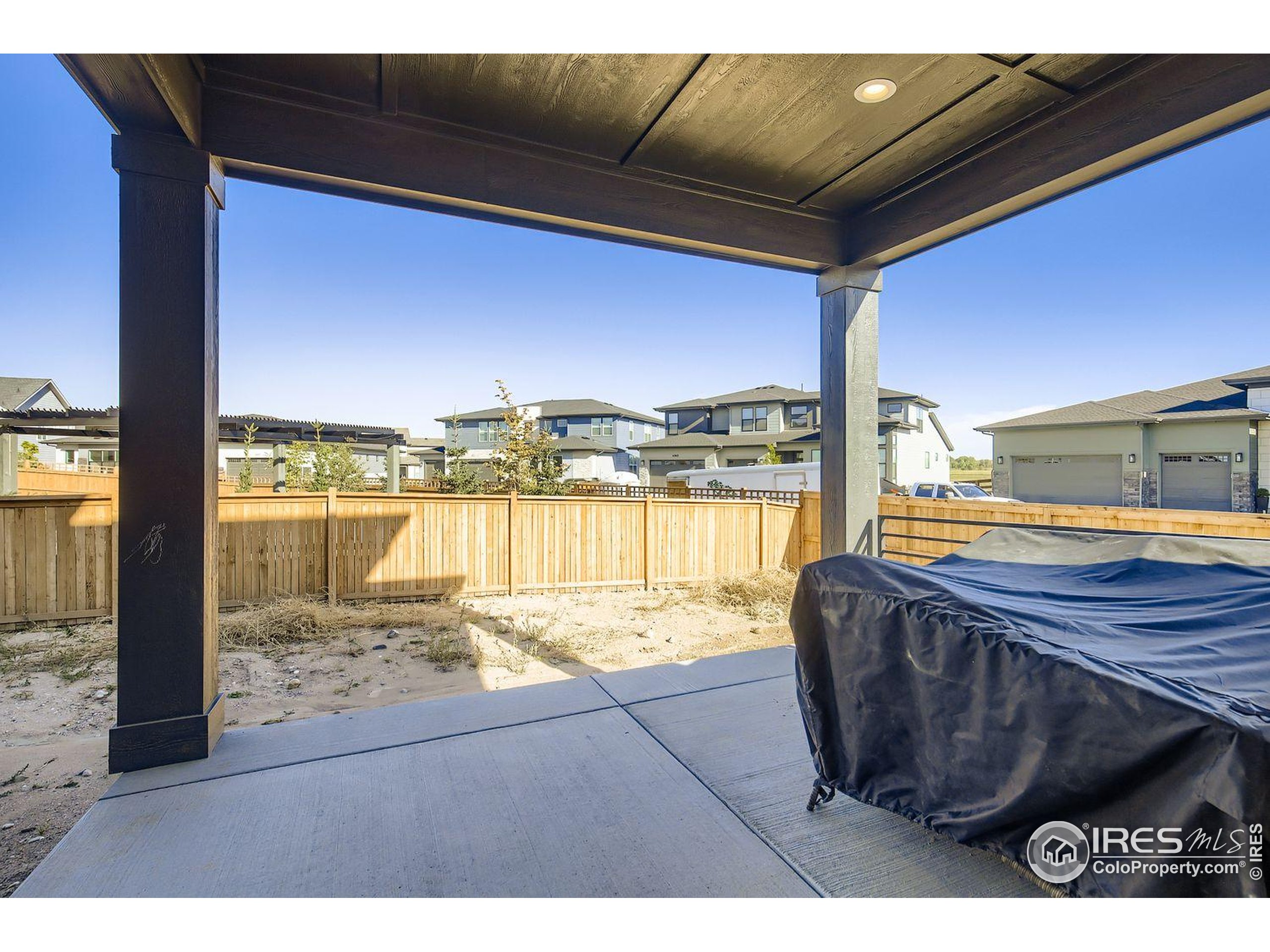 4359 Shivaree Street Timnath, CO 80547 - Photo 28 of 29 a living room with a large window