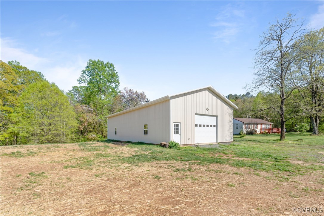 626 Haden Martin Road Palmyra, VA 22963 - Photo 40 of 44 View of side of home featuring a detached garage a
