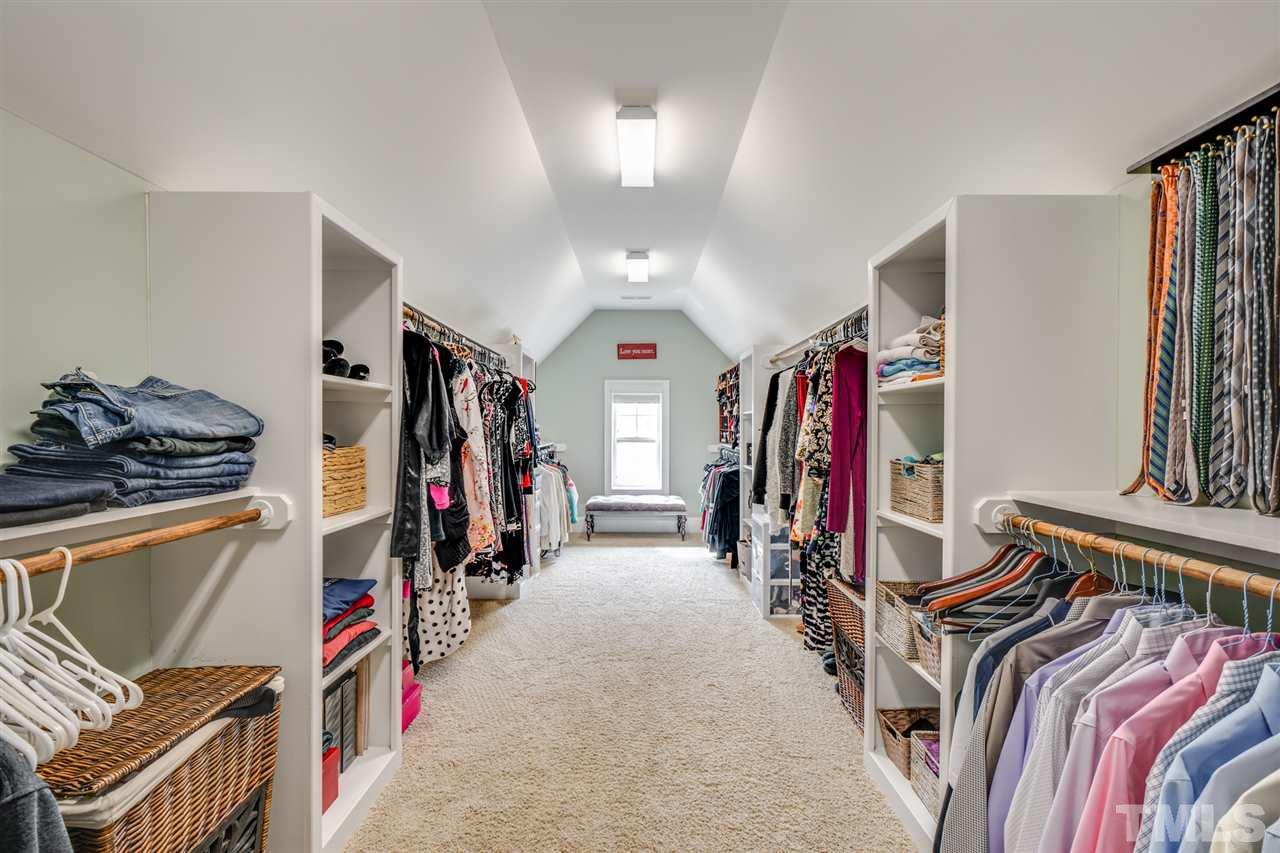 2212 Big Lake Court Raleigh, NC 27607 - Photo 18 of 30 The upstairs master walk-in closet of your dreams!