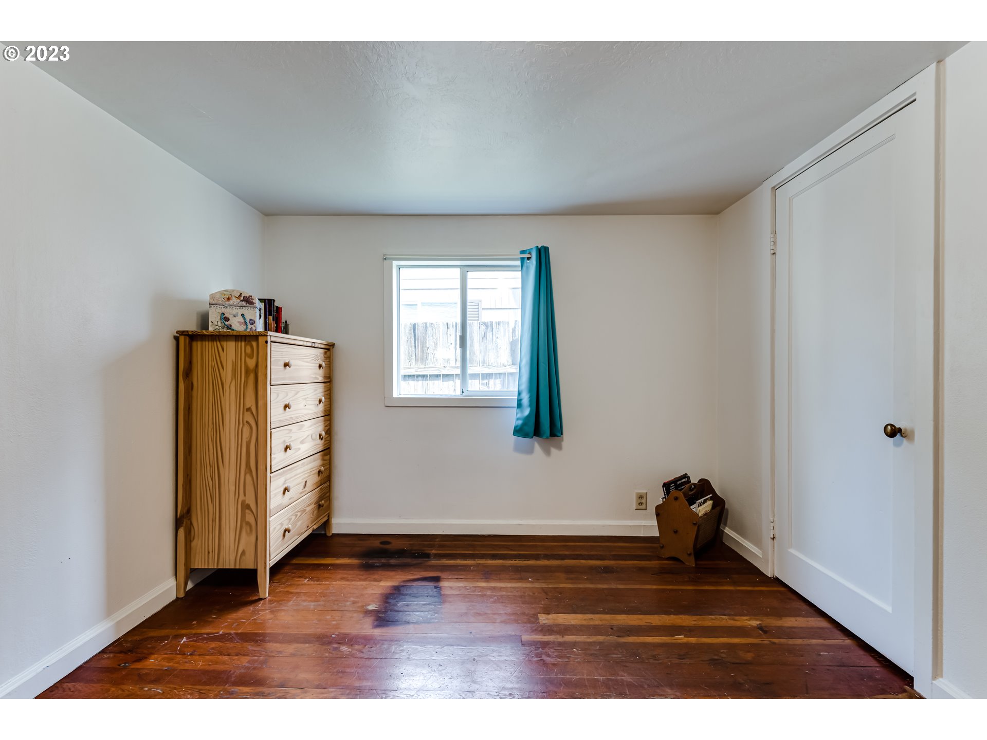 1858 I Street Springfield, OR 97477 - Photo 19 of 23 a view of an empty room with closet and windows
