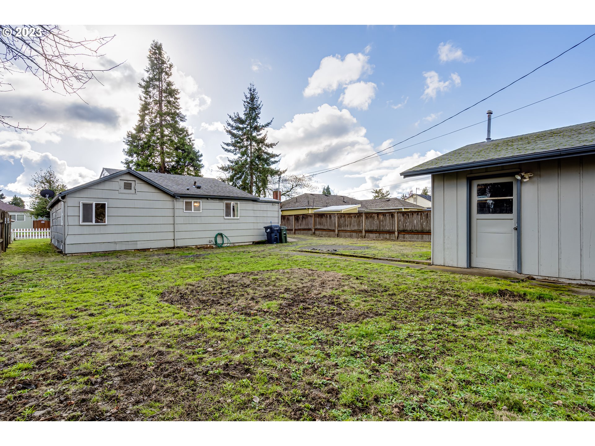 1858 I Street Springfield, OR 97477 - Photo 23 of 23 a backyard of a house with lots of green space