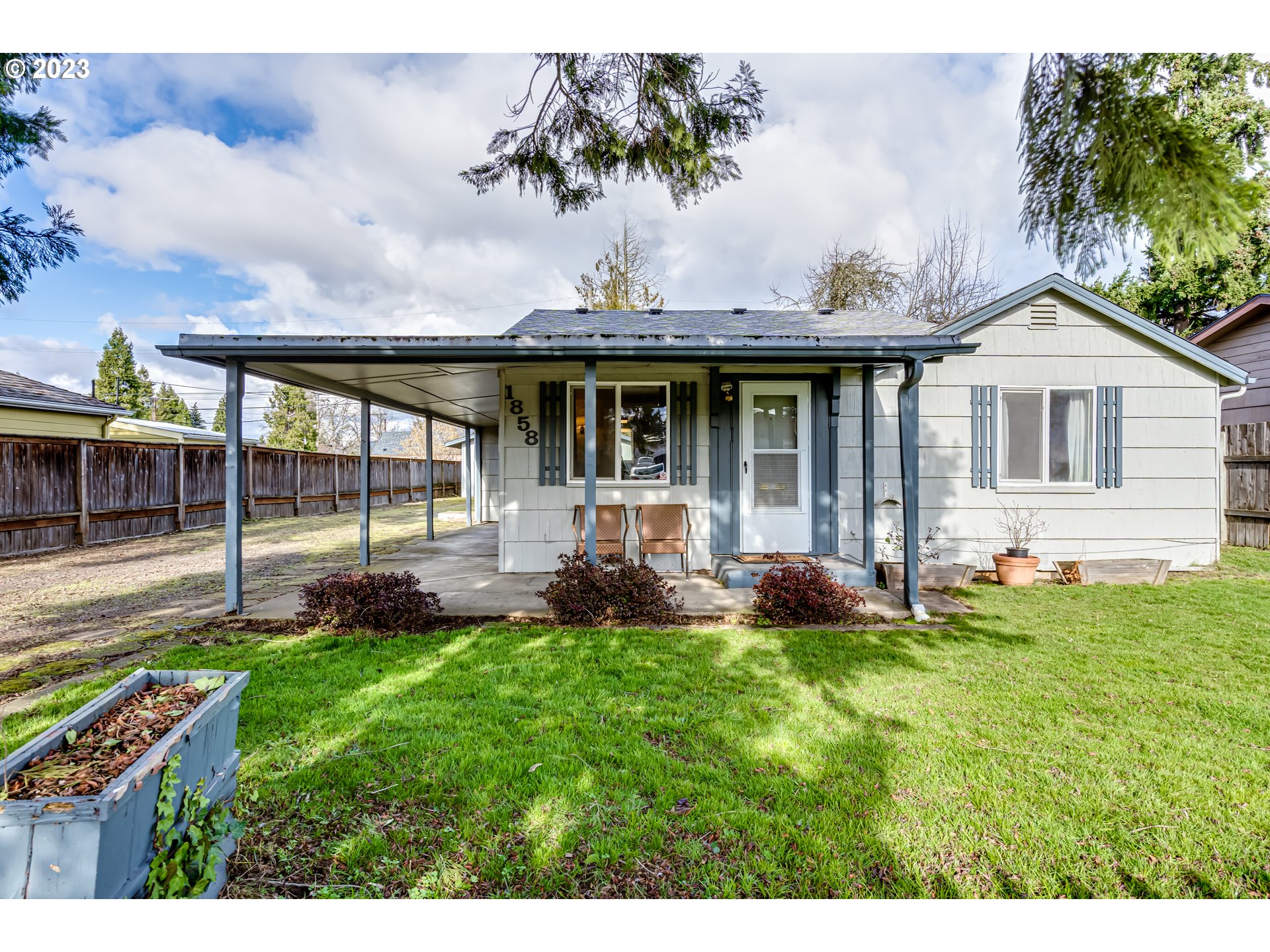 1858 I Street Springfield, OR 97477 - Photo 3 of 23 a view of a house with a yard and sitting area