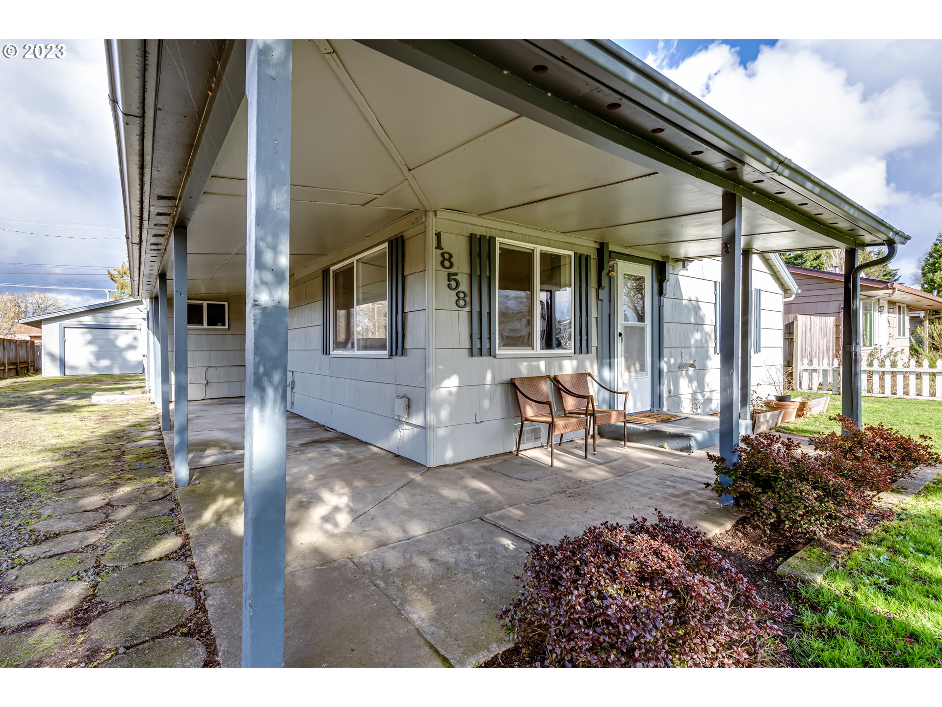 1858 I Street Springfield, OR 97477 - Photo 5 of 23 a view of a house with backyard and sitting area