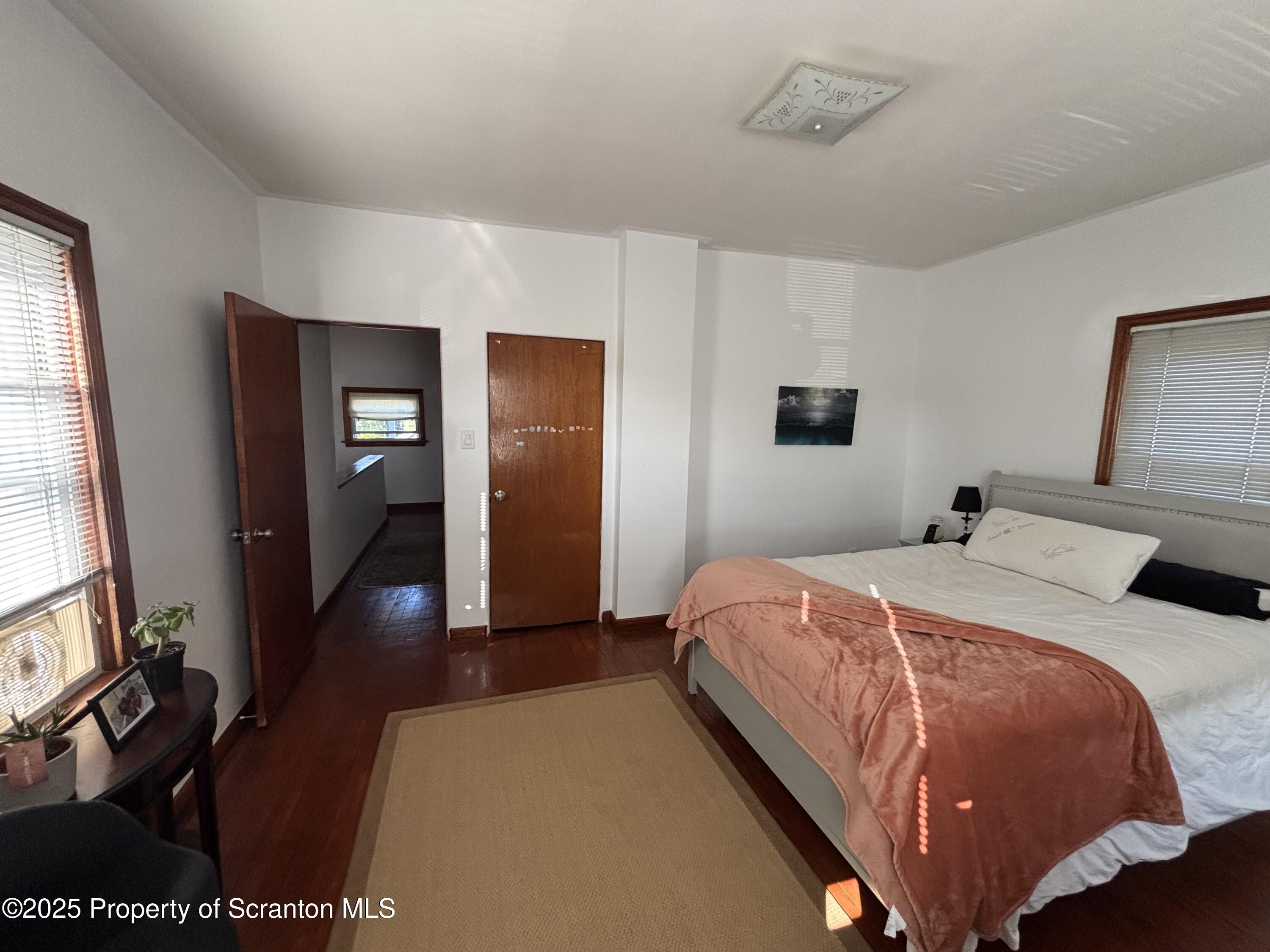 719 Saginaw Street Scranton, PA 18505 - Photo 17 of 23 a bedroom with bed and window