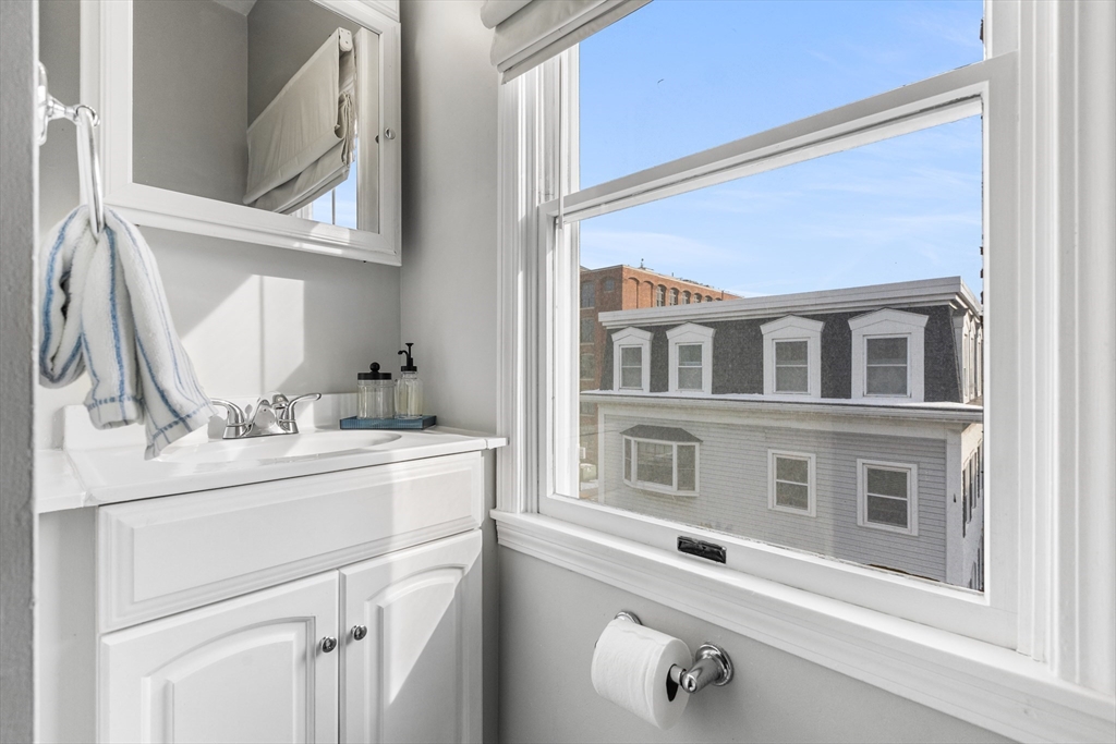 100 Pearl Street, Unit 2 Boston, MA 02129 - Photo 19 of 25 a view of a kitchen with a sink and cabinets