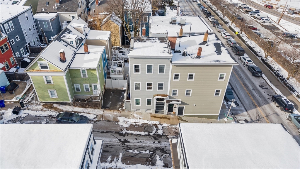 100 Pearl Street, Unit 2 Boston, MA 02129 - Photo 23 of 25 a view of a house with a park