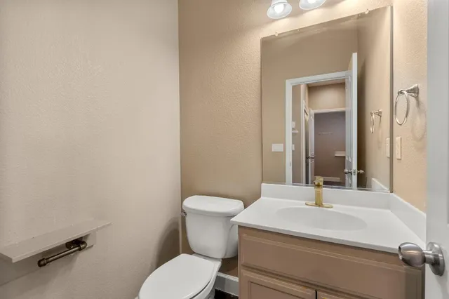 a bathroom with a sink and a window