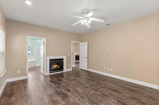a large bathroom with a large tub and shower