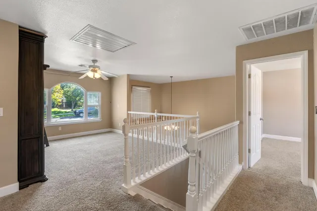 a view of a livingroom with shelves