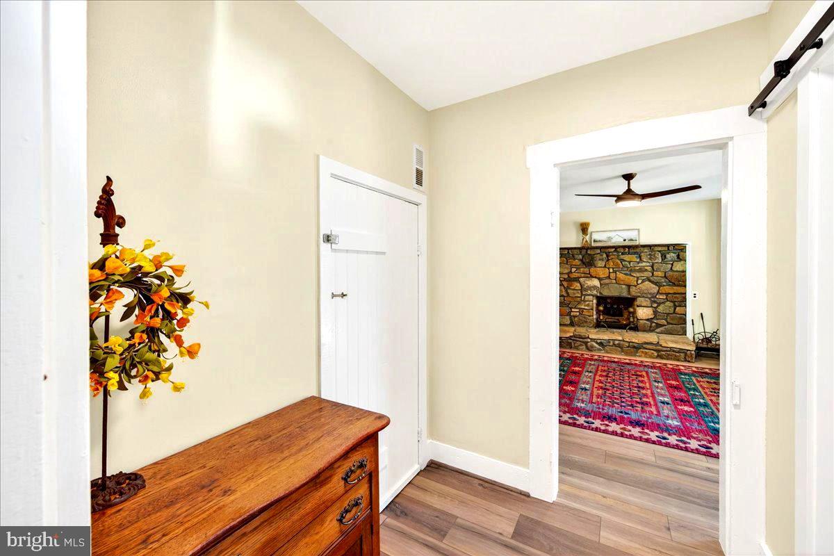 290 Riley Hollow Road Huntly, VA 22640 - Photo 45 of 148 a view of a room with wooden floor and cabinet