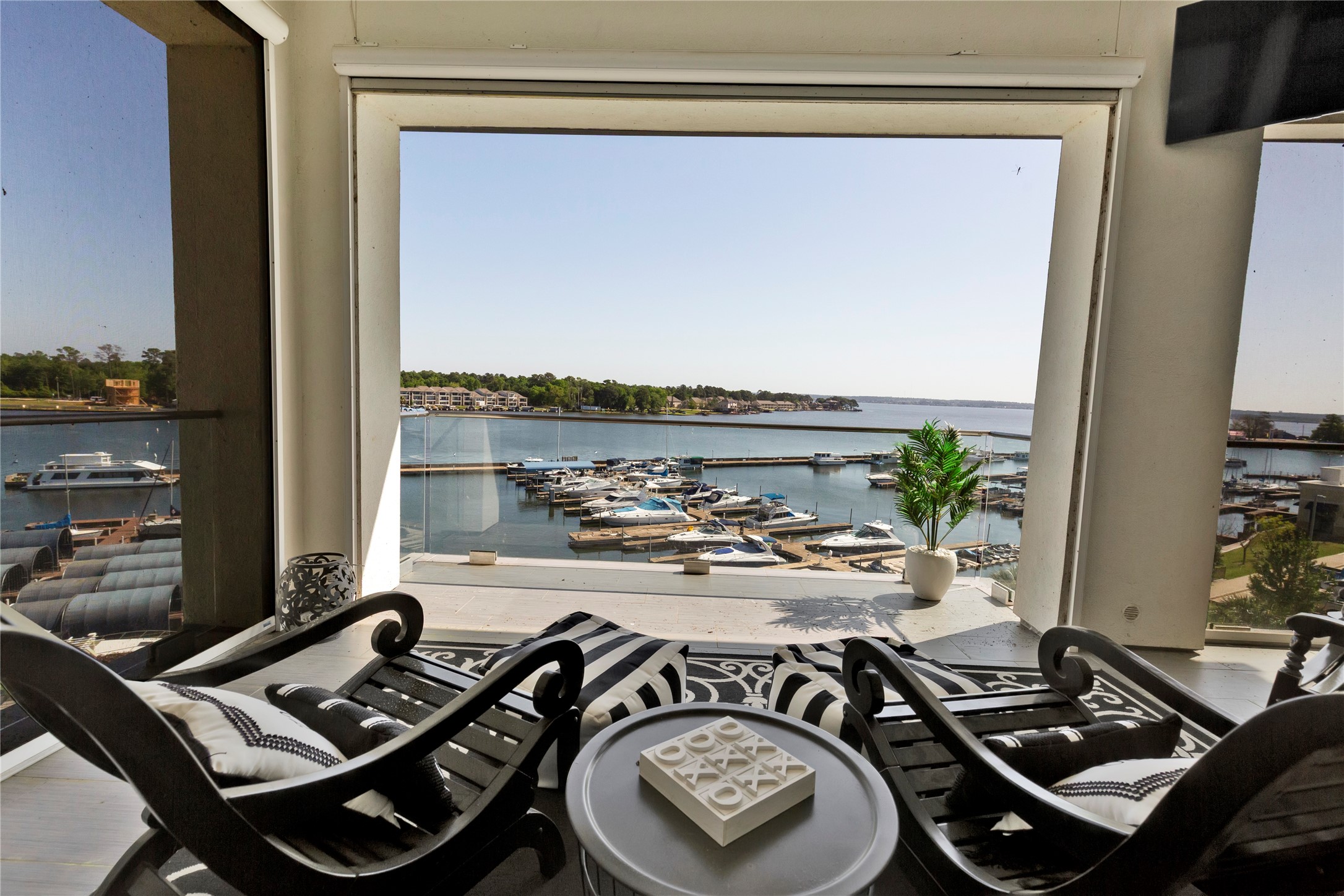 199 Waterpoint Court, Unit 412 Conroe, TX 77304 - Photo 1 of 29 a view of a workspace with furniture