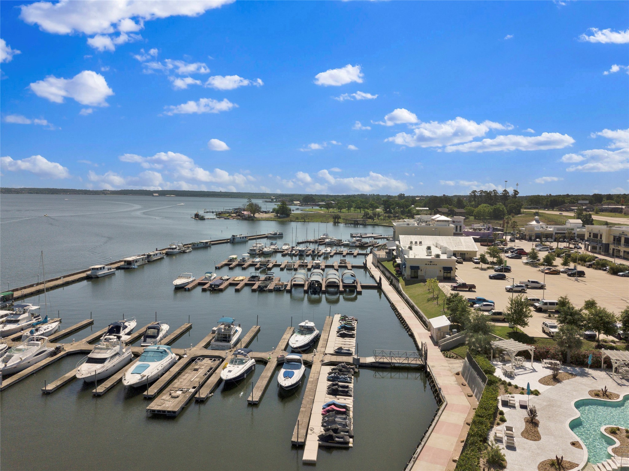 199 Waterpoint Court, Unit 412 Conroe, TX 77304 - Photo 27 of 29 an aerial view of a city