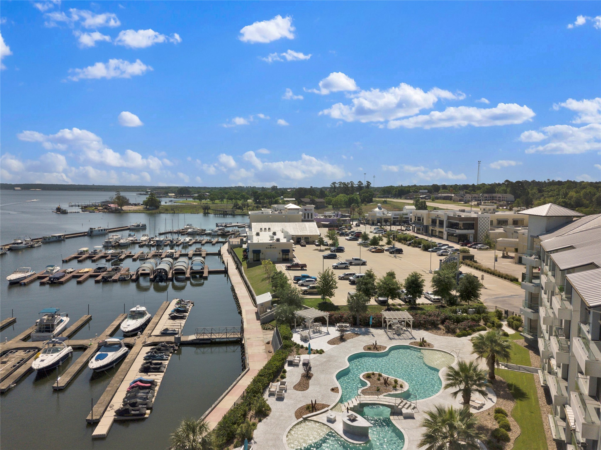 199 Waterpoint Court, Unit 412 Conroe, TX 77304 - Photo 28 of 29 an aerial view of a city