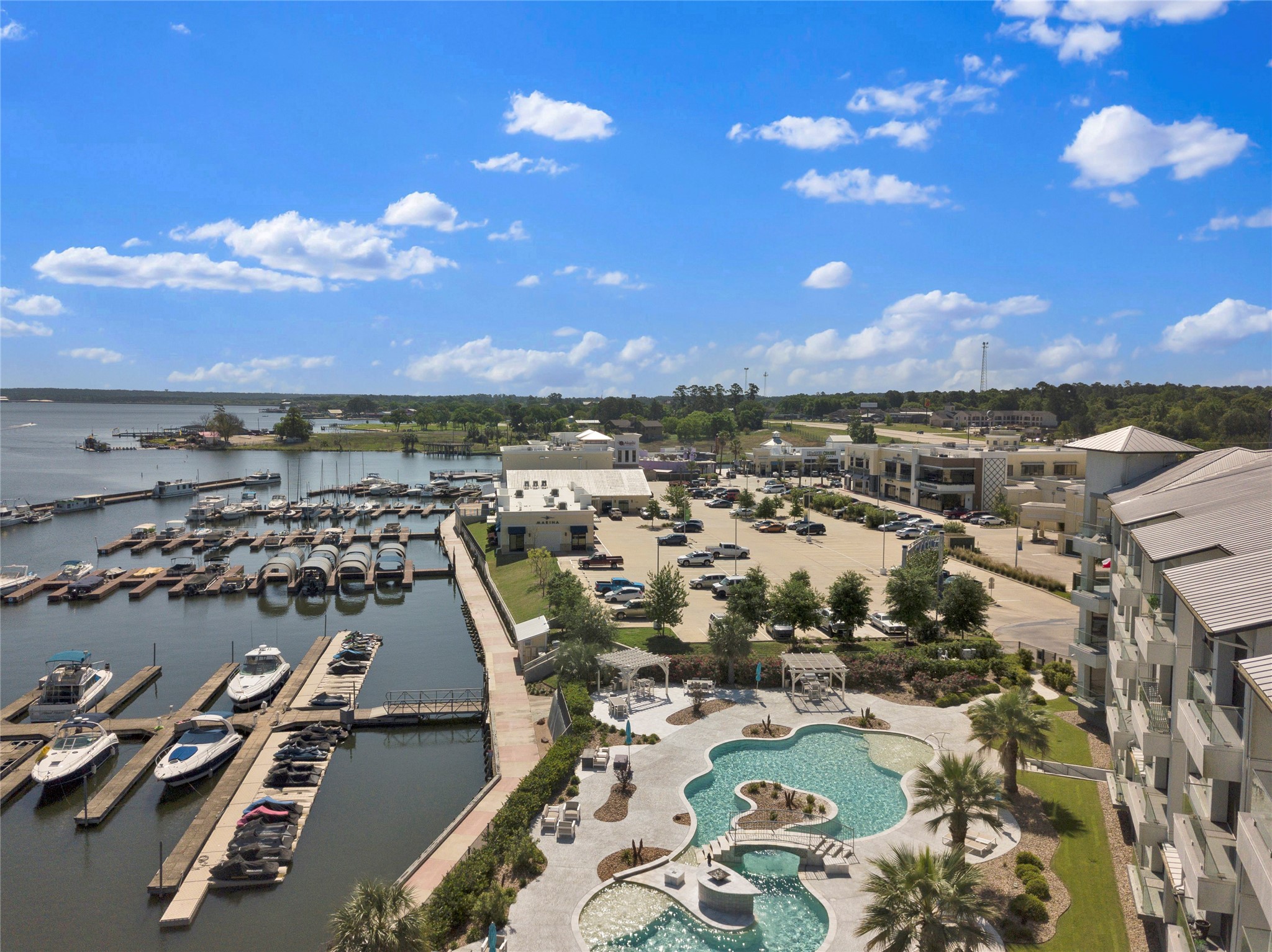 199 Waterpoint Court, Unit 412 Conroe, TX 77304 - Photo 3 of 29 an aerial view of a city