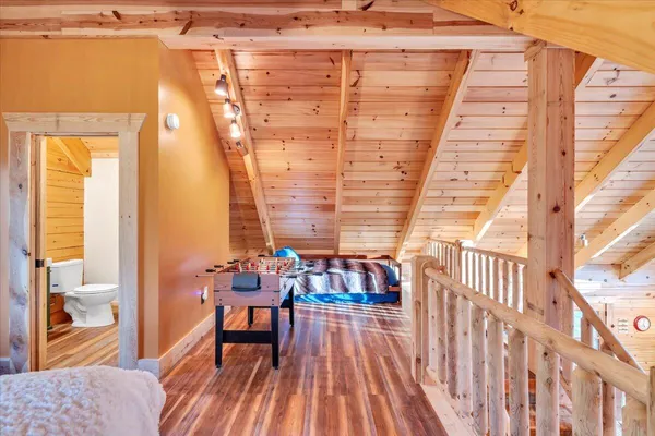 a view of a yard with mountains in the background