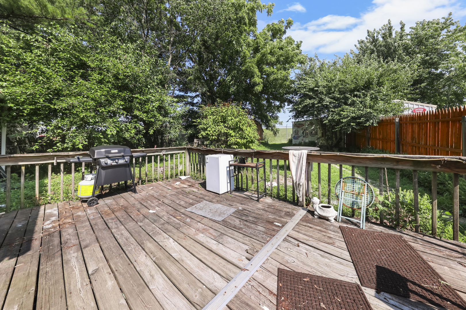 180 Highway 6 Morris, IL 60450 - Photo 17 of 18 a balcony with wooden floor and fence