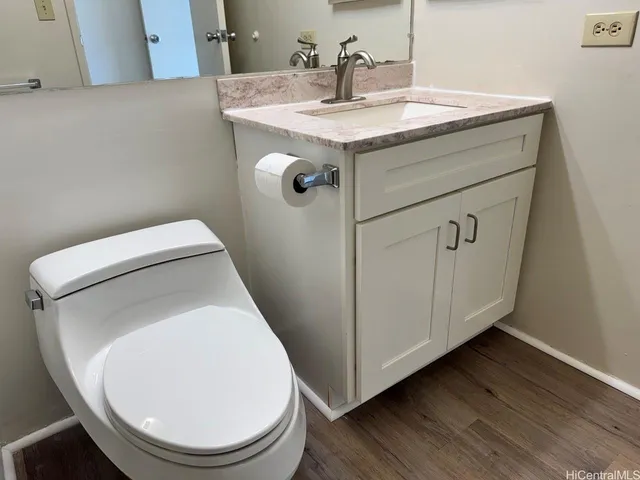 a utility room with a sink washer and dryer