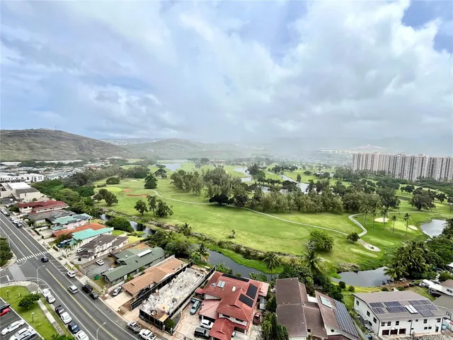 an aerial view of a city with lots of residential buildings