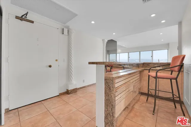 a view of kitchen with wooden floor