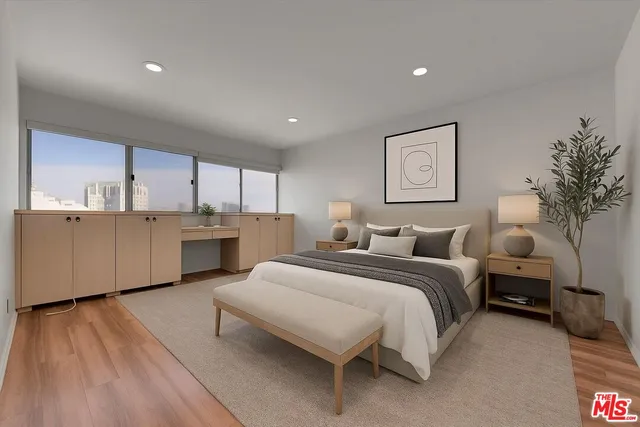a bathroom with a double vanity sink mirror and shower