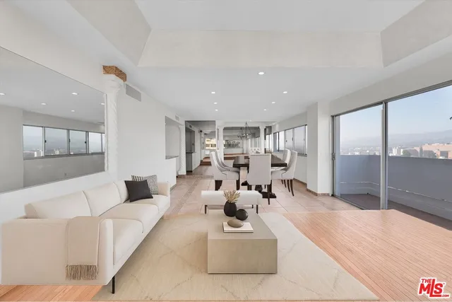 a view of kitchen with refrigerator and window