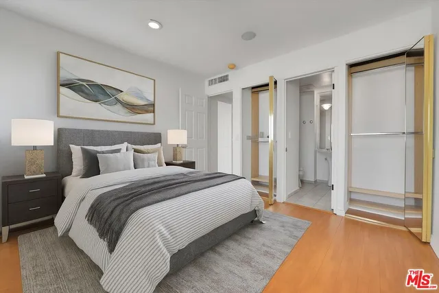 a view of a hallway with seating area