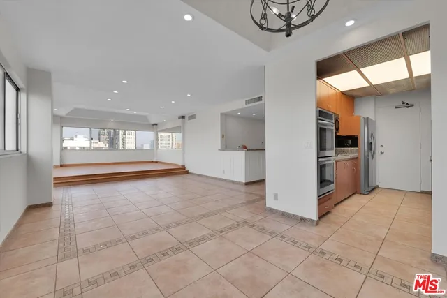 a view of kitchen with wooden floor