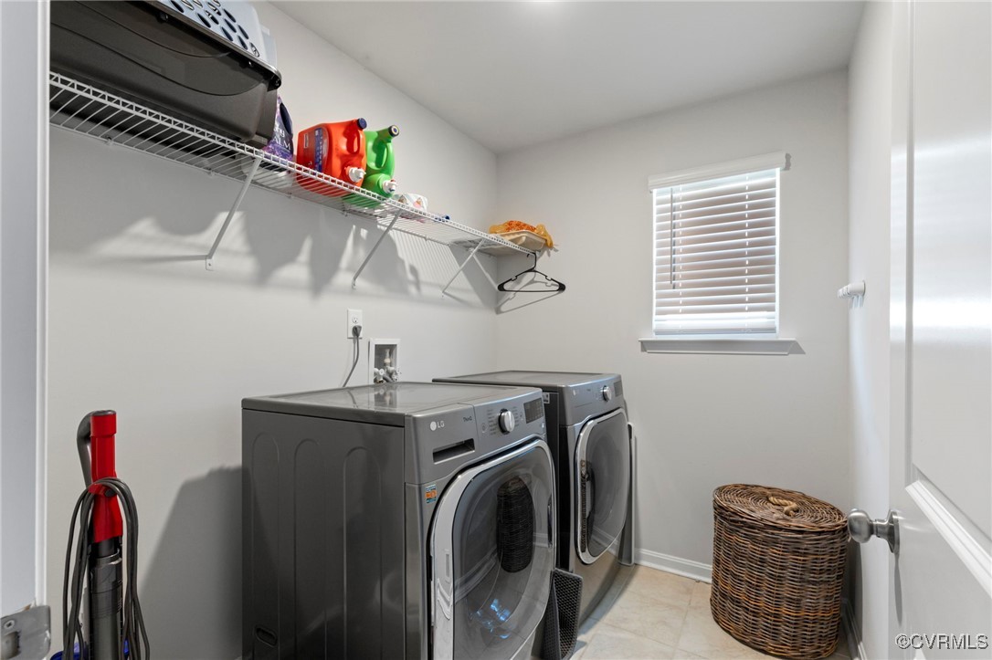 9801 Cravensford Loop Midlothian, VA 23112 - Photo 23 of 49 a view of storage and utility room with washer and dryer