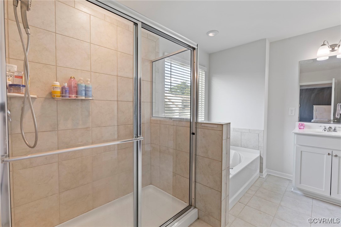 9801 Cravensford Loop Midlothian, VA 23112 - Photo 29 of 49 a bathroom with a bathtub and shower