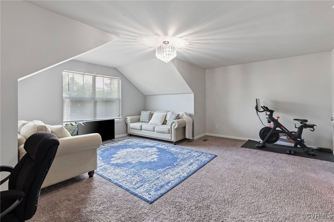 9801 Cravensford Loop Midlothian, VA 23112 - Photo 31 of 49 a living room with furniture and a rug