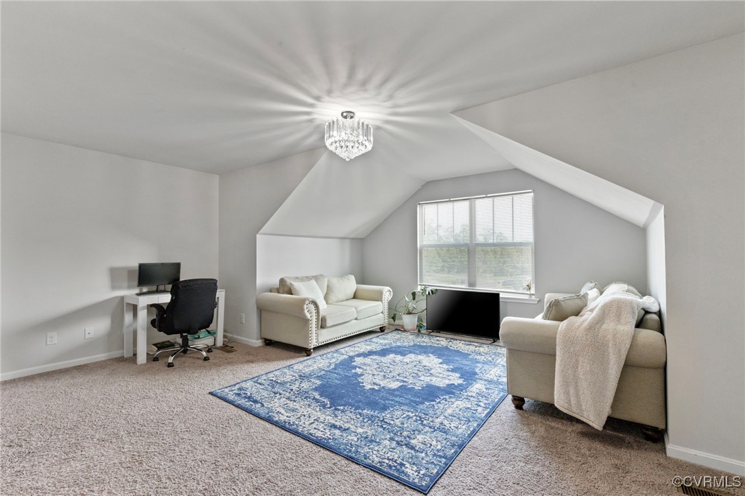 9801 Cravensford Loop Midlothian, VA 23112 - Photo 32 of 49 a living room with furniture fireplace and window