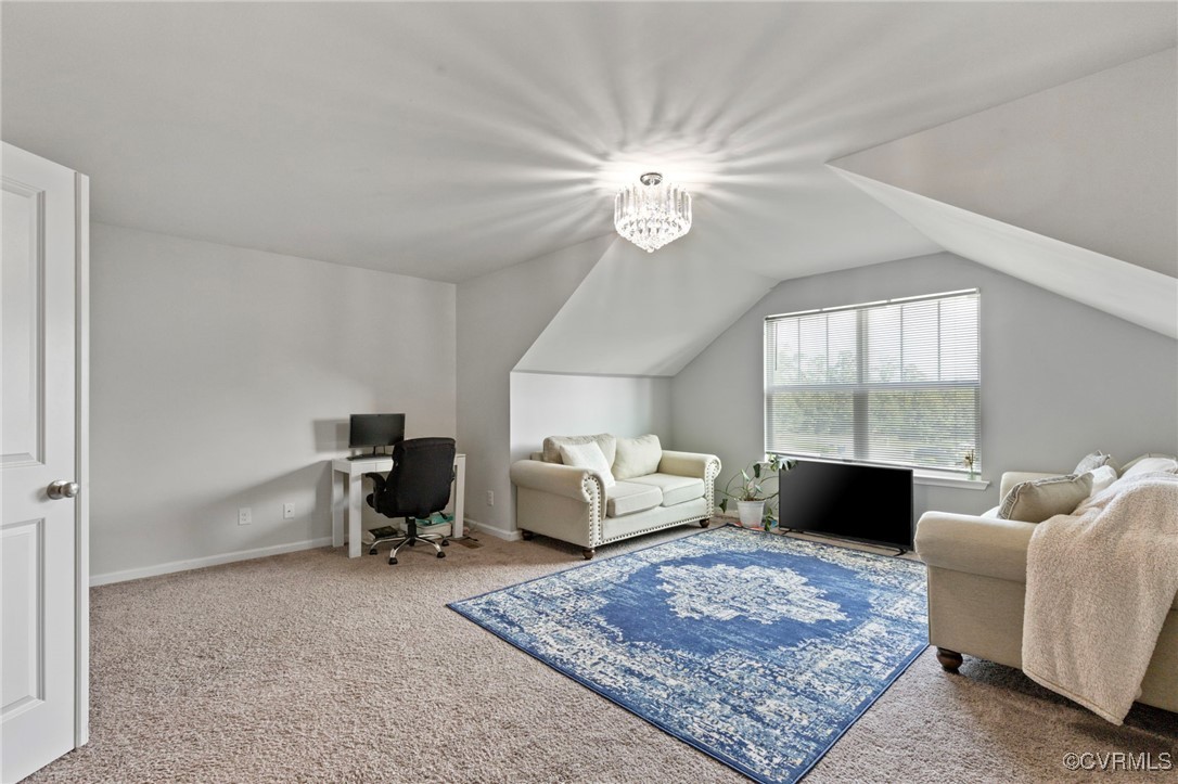 9801 Cravensford Loop Midlothian, VA 23112 - Photo 33 of 49 a living room with furniture and a window