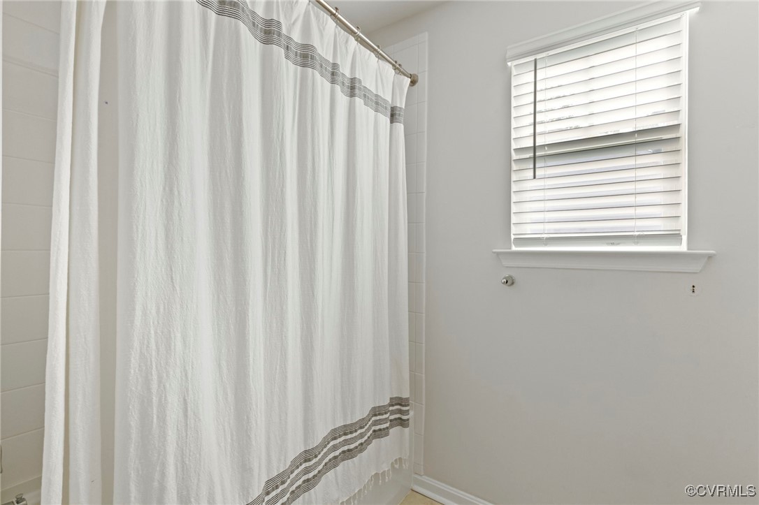 9801 Cravensford Loop Midlothian, VA 23112 - Photo 36 of 49 a view of a window with a curtain