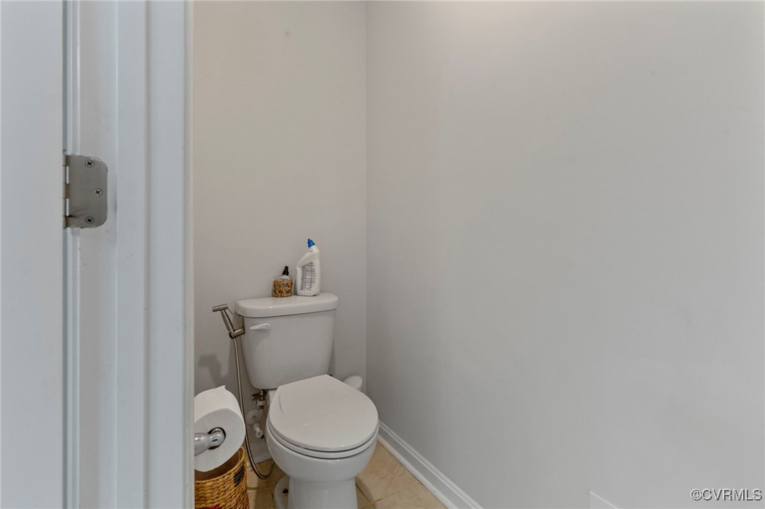 9801 Cravensford Loop Midlothian, VA 23112 - Photo 39 of 49 a white toilet sitting next to a shower