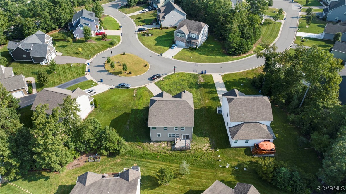 9801 Cravensford Loop Midlothian, VA 23112 - Photo 45 of 49 an aerial view of a house with swimming pool and big yard
