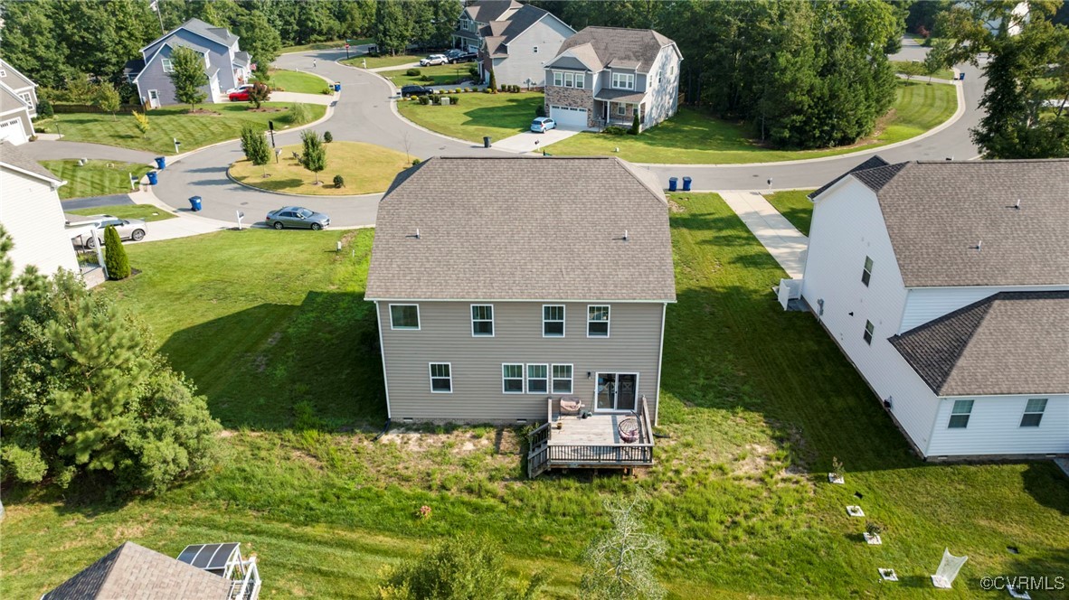 9801 Cravensford Loop Midlothian, VA 23112 - Photo 46 of 49 an aerial view of a house with swimming pool garden and patio