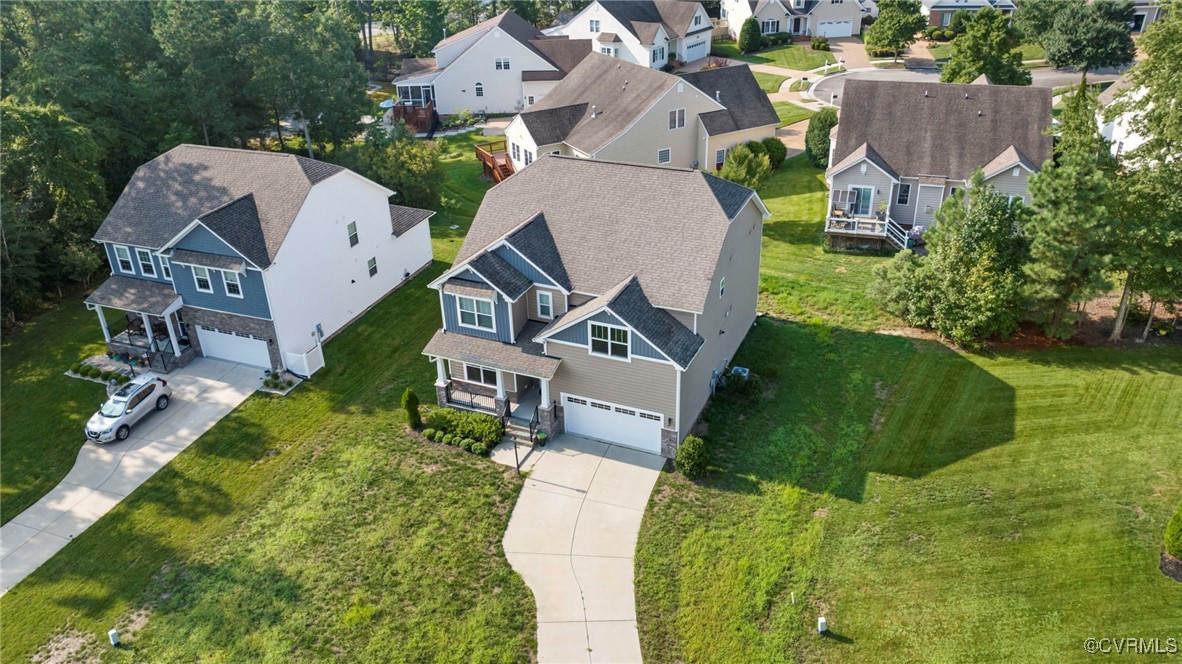9801 Cravensford Loop Midlothian, VA 23112 - Photo 49 of 49 an aerial view of a house with a garden