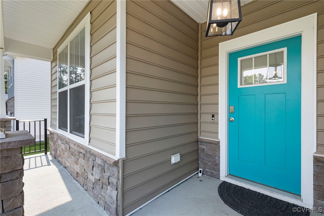 9801 Cravensford Loop Midlothian, VA 23112 - Photo 5 of 49 a view of a porch