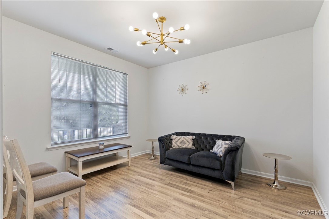 9801 Cravensford Loop Midlothian, VA 23112 - Photo 7 of 49 a living room with furniture and a window