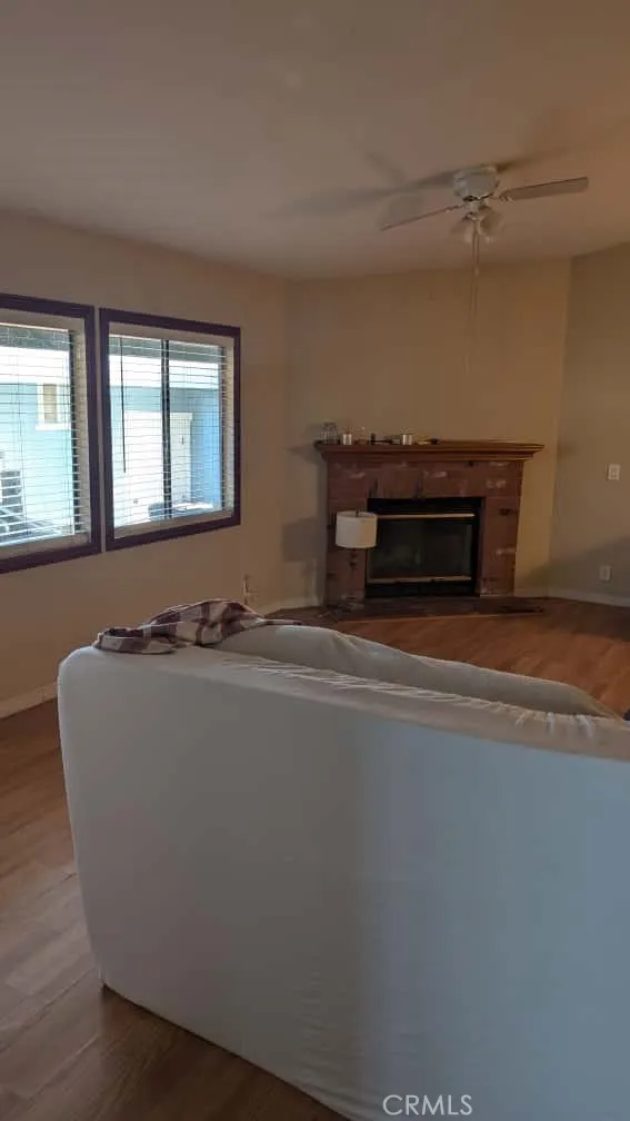 12300 West Lilac Avenue, Unit 714 Santa Ana, CA 92704 - Photo 10 of 22 a living room with furniture and a piano