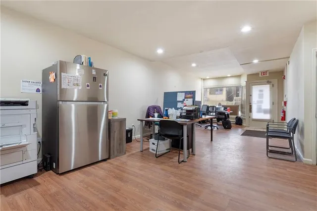 a view of a workspace with furniture