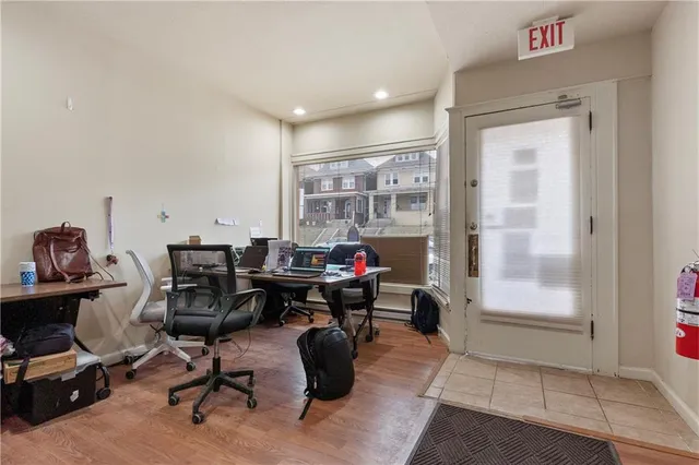 a view of a livingroom with wooden floor