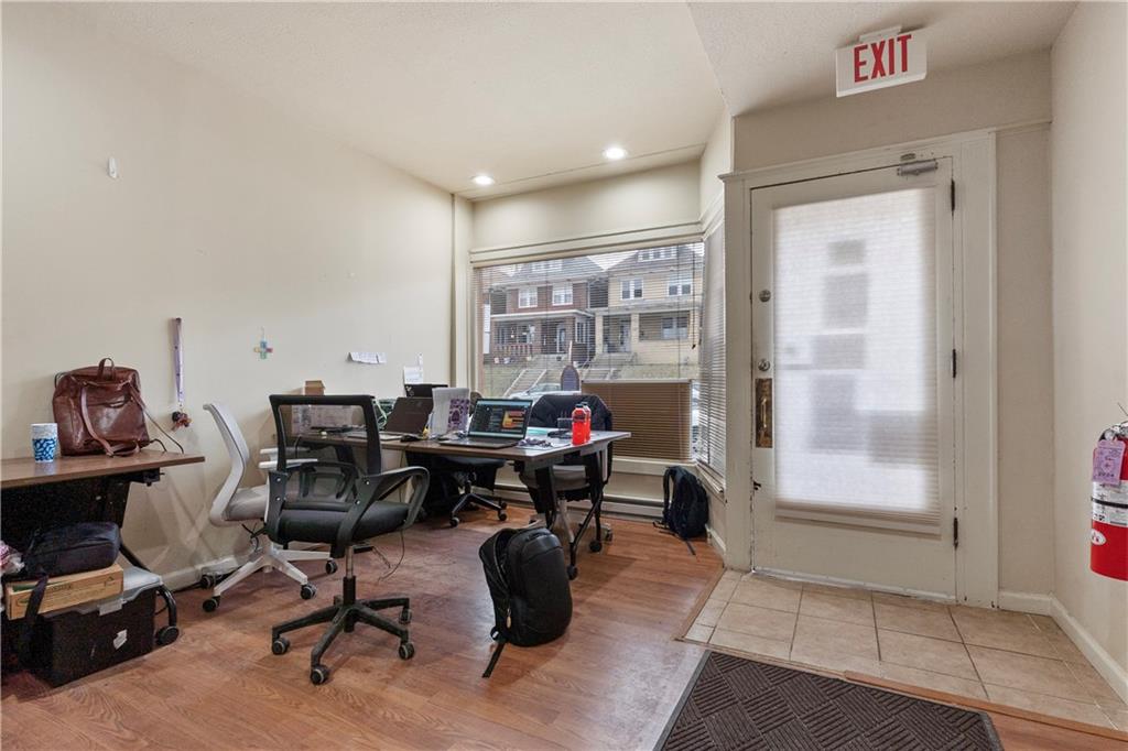 2114 Broadway Avenue Pittsburgh, PA 15216 - Photo 14 of 24 a living room with furniture and a window