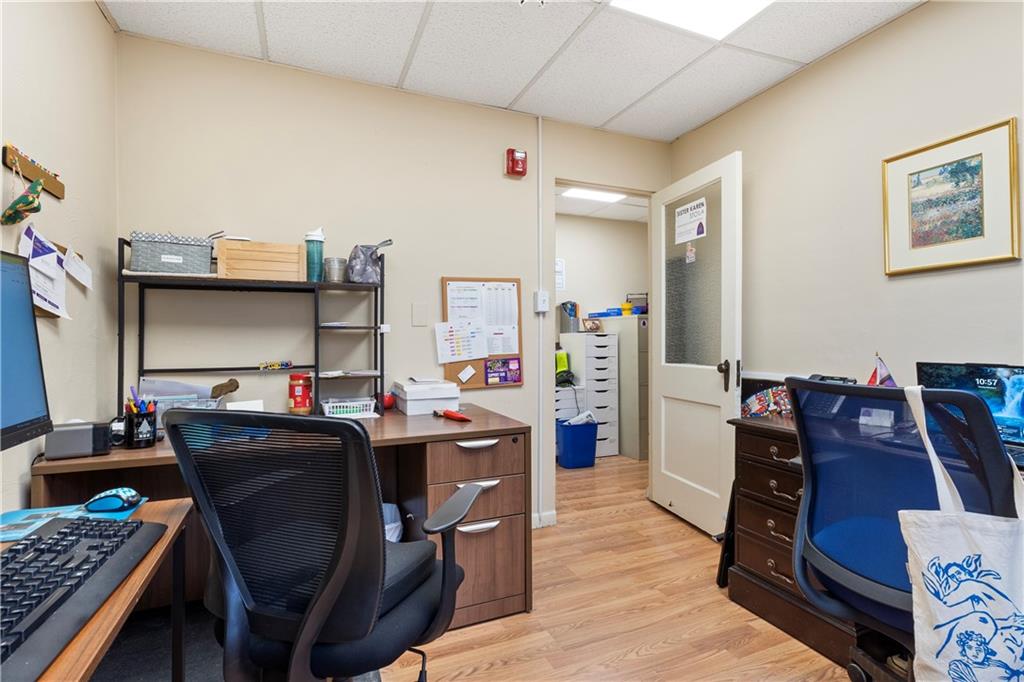 2114 Broadway Avenue Pittsburgh, PA 15216 - Photo 17 of 24 a workspace with furniture and wooden floor