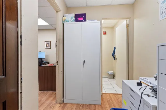 a workspace with furniture and a flat screen tv