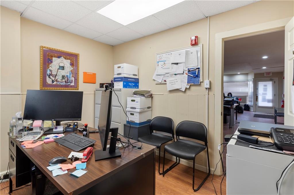 2114 Broadway Avenue Pittsburgh, PA 15216 - Photo 22 of 24 a workspace with furniture and a flat screen tv