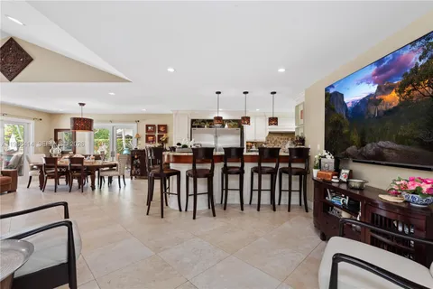 a group of people sitting in a living room
