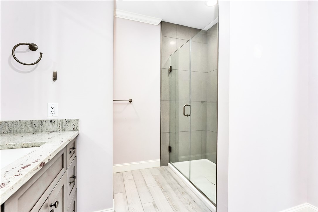 1 Compass Way, Unit 101 Westerly, RI 02891 - Photo 15 of 27 Subway tile in the main bathroom